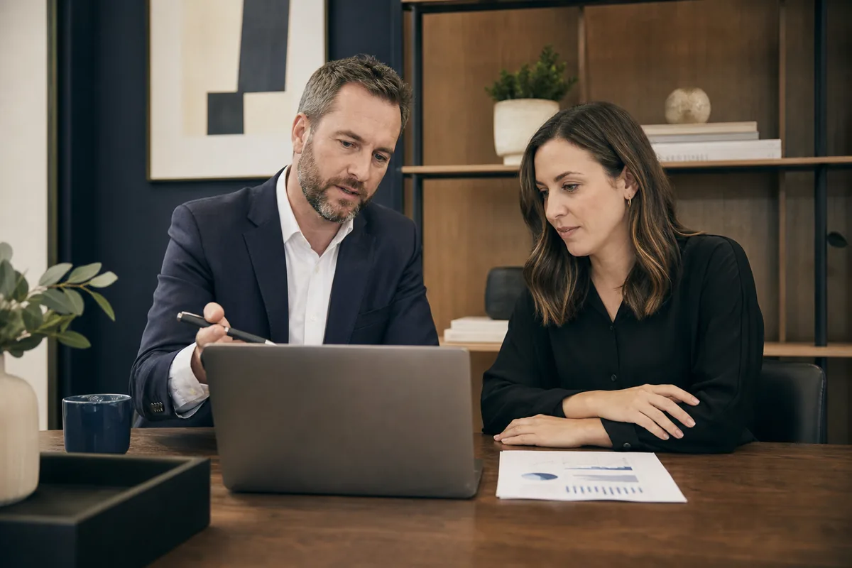 Fractional CFO advising a small business owner during a financial strategy meeting